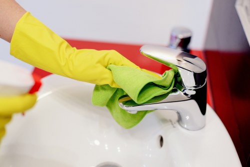 Office cleaners working in a Belsizepark commercial workspace